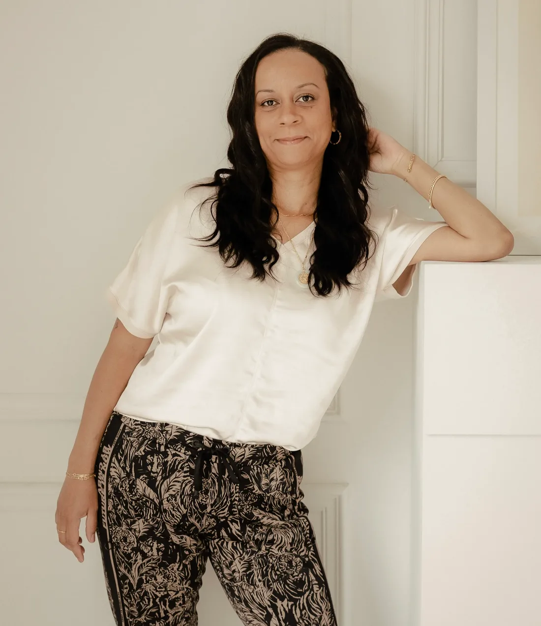 Gabrielle Thomas, founder of Upwellery, standing in a bright white studio